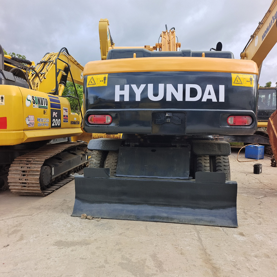 HYUNDAI 210W-9 - Колёсный экскаватор: фото 4 HYUNDAI 210W-9 - Колёсный экскаватор: фото 4