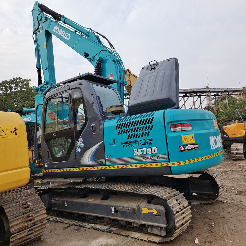 KOBELCO SK140 - Гусеничный экскаватор: фото 1 KOBELCO SK140 - Гусеничный экскаватор: фото 1