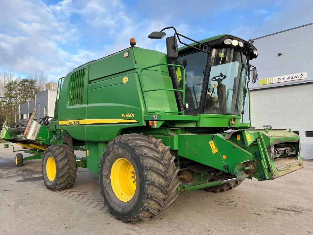 John Deere W 650 i - Зерноуборочный комбайн: фото 1 John Deere W 650 i - Зерноуборочный комбайн: фото 1