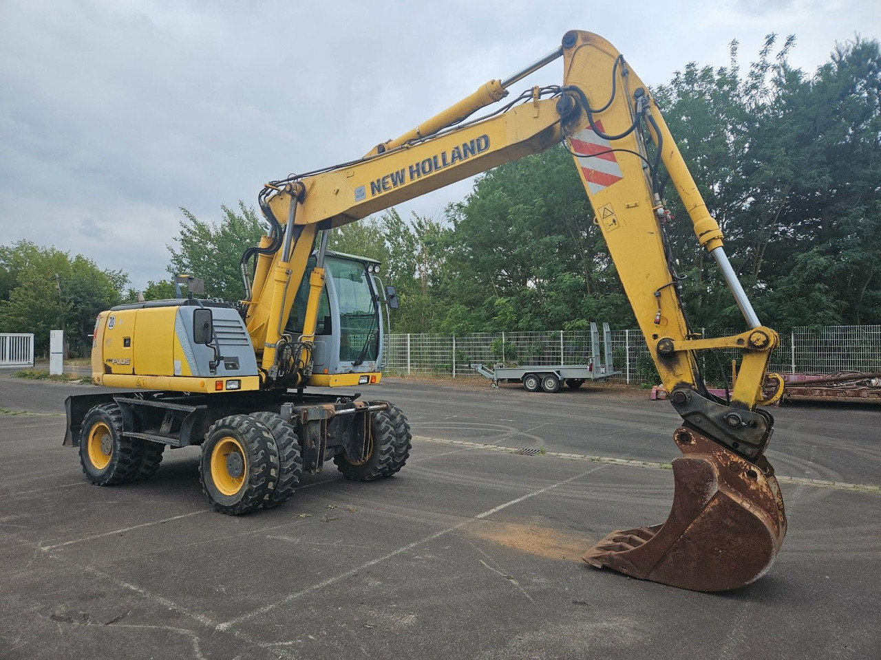 New Holland MH Plus 18t Mobilbagger - Колёсный экскаватор: фото 1 New Holland MH Plus 18t Mobilbagger - Колёсный экскаватор: фото 1