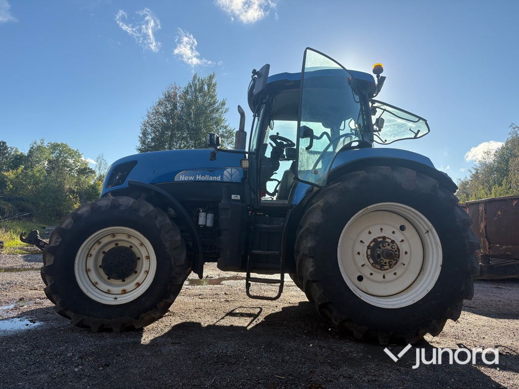 Traktor New Holland T7040 - Трактор: фото 4 Traktor New Holland T7040 - Трактор: фото 4