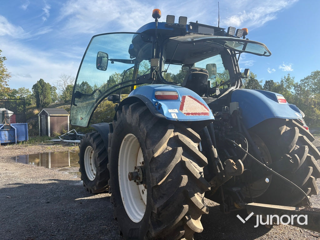 Traktor New Holland T7040 - Трактор: фото 5 Traktor New Holland T7040 - Трактор: фото 5