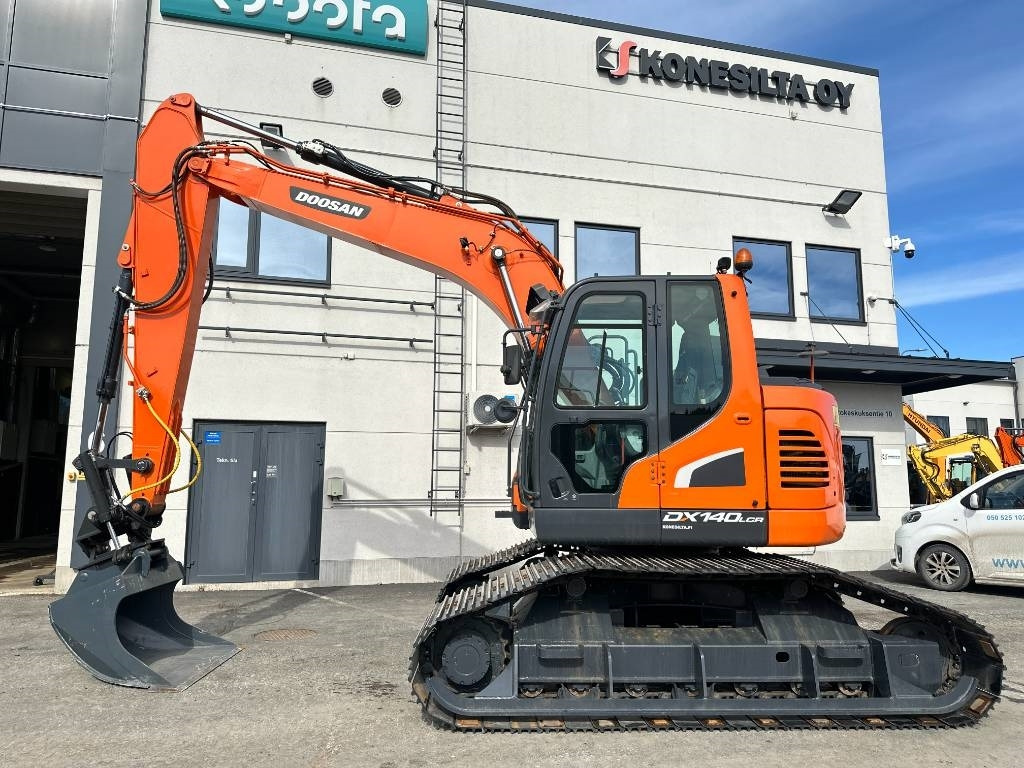 Doosan DX 140 LCR-5 metsäalusta - Гусеничный экскаватор: фото 1 Doosan DX 140 LCR-5 metsäalusta - Гусеничный экскаватор: фото 1