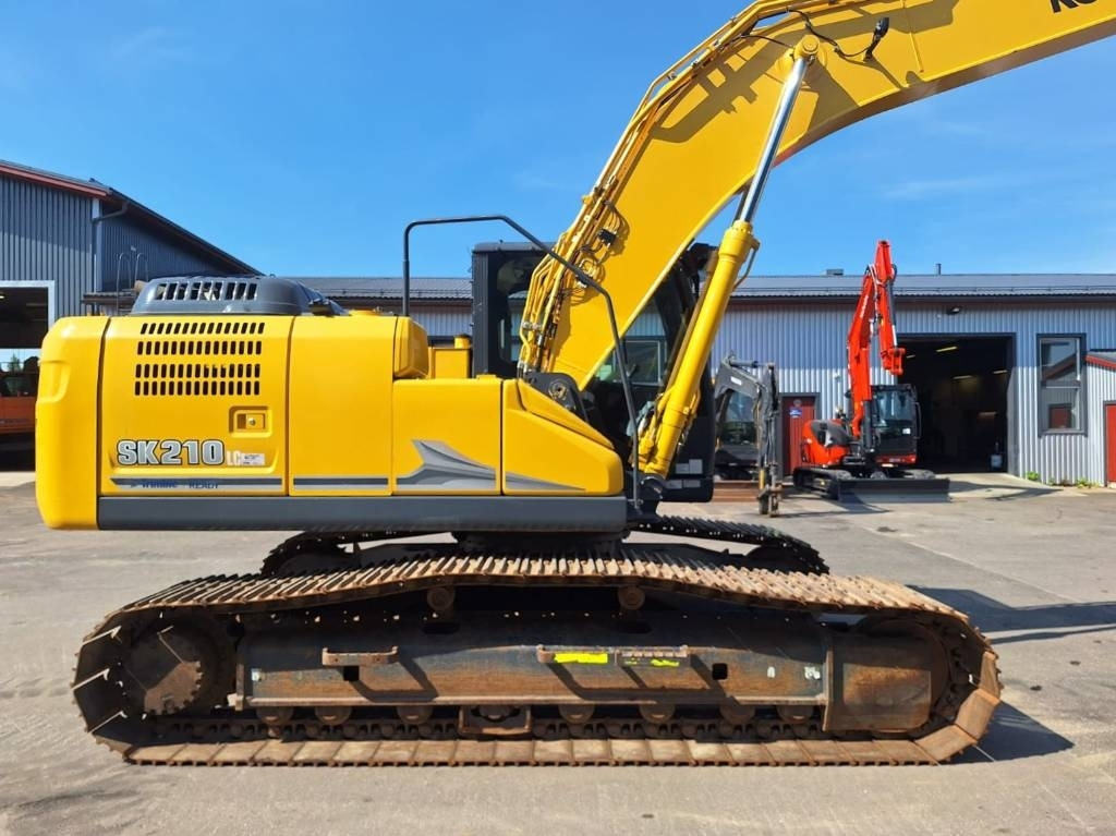 Kobelco SK210LC-11 PYÖRITTÄJÄLLÄ  - Гусеничный экскаватор: фото 5 Kobelco SK210LC-11 PYÖRITTÄJÄLLÄ  - Гусеничный экскаватор: фото 5