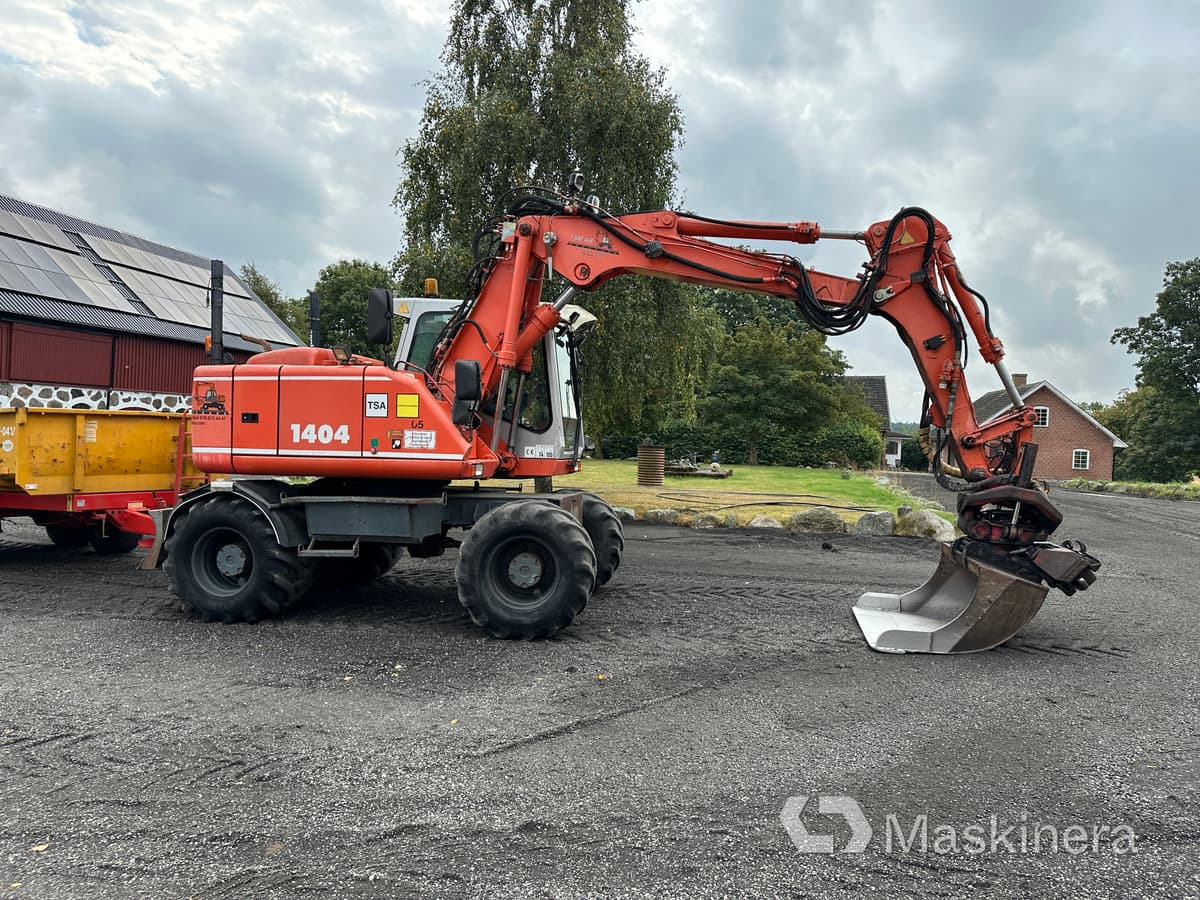 Hjulgrävare Atlas 1404 + tippvagn/redskap - Гусеничный экскаватор: фото 4 Hjulgrävare Atlas 1404 + tippvagn/redskap - Гусеничный экскаватор: фото 4