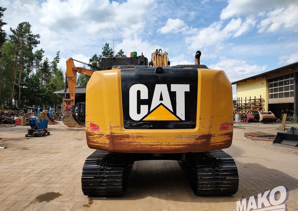 Caterpillar 312 E - Гусеничный экскаватор: фото 3 Caterpillar 312 E - Гусеничный экскаватор: фото 3