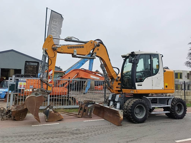Liebherr A 910 Compact mobiele graafmachine excavator 12,5T - Колёсный экскаватор: фото 1 Liebherr A 910 Compact mobiele graafmachine excavator 12,5T - Колёсный экскаватор: фото 1