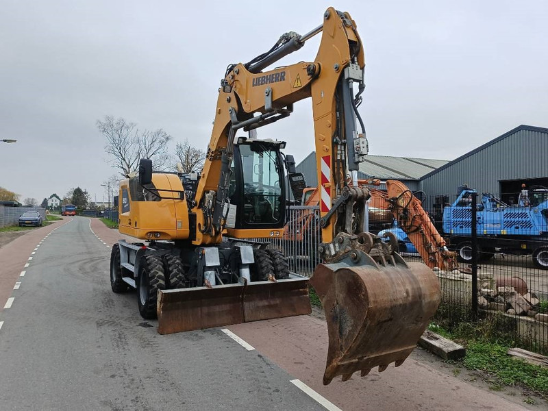 Liebherr A 910 Compact mobiele graafmachine excavator 12,5T - Колёсный экскаватор: фото 4 Liebherr A 910 Compact mobiele graafmachine excavator 12,5T - Колёсный экскаватор: фото 4