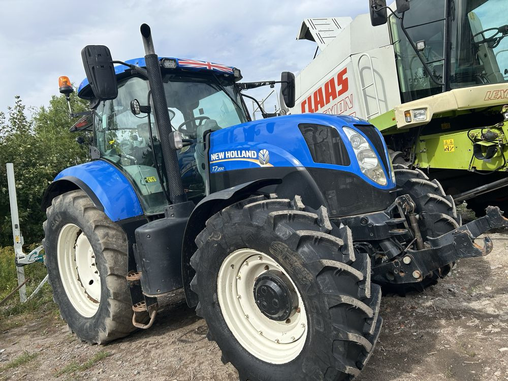 New Holland T7.200 skrzynia stopniowa 2013r TUZ Monitor Nowe Opon - Трактор: фото 1 New Holland T7.200 skrzynia stopniowa 2013r TUZ Monitor Nowe Opon - Трактор: фото 1