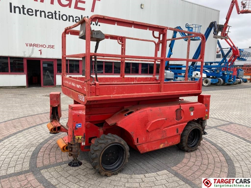 Haulotte Compact 10DX Diesel 4x4 Scissor Work Lift 1015cm - Ножничный подъемник: фото 1 Haulotte Compact 10DX Diesel 4x4 Scissor Work Lift 1015cm - Ножничный подъемник: фото 1