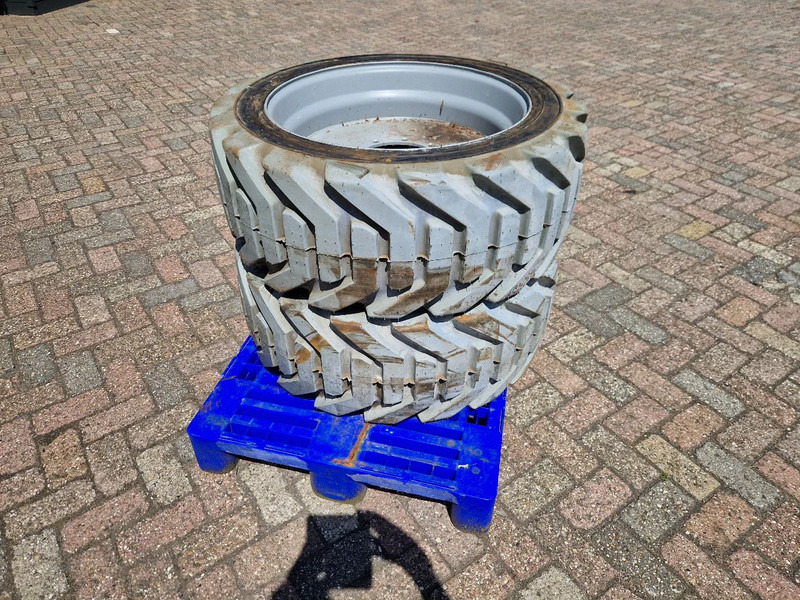 Onbekend 3x nieuwe OUTRIGGER volgeschuimde hoogwerkerband met velg - Шина: фото 1 Onbekend 3x nieuwe OUTRIGGER volgeschuimde hoogwerkerband met velg - Шина: фото 1