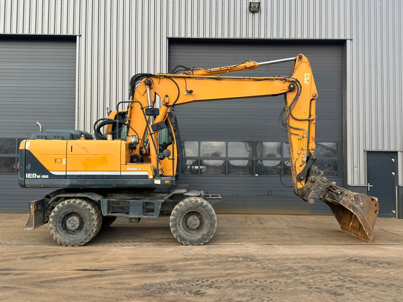 Hyundai Robex 180W-9A - Колёсный экскаватор: фото 5 Hyundai Robex 180W-9A - Колёсный экскаватор: фото 5