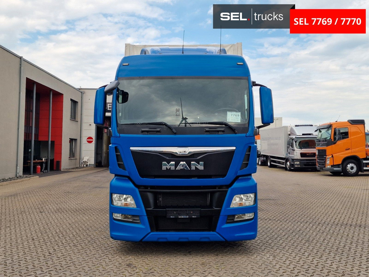 MAN TGX 18.440 4X2 LL-U/ Intarder/ Hubdach/Durchlade - Тентованный грузовик: фото 2 MAN TGX 18.440 4X2 LL-U/ Intarder/ Hubdach/Durchlade - Тентованный грузовик: фото 2