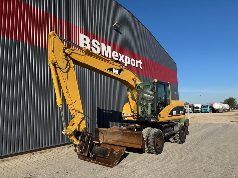Caterpillar M 316 C - Колёсный экскаватор: фото 1 Caterpillar M 316 C - Колёсный экскаватор: фото 1