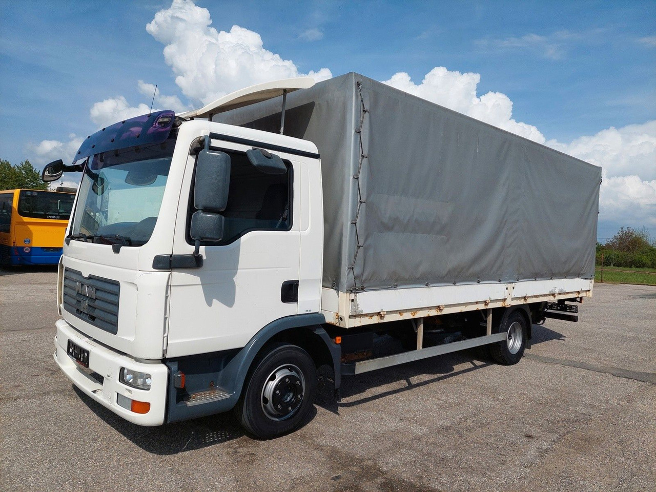 MAN TGL 8.180 4X2 BL - Тентованный грузовик: фото 1 MAN TGL 8.180 4X2 BL - Тентованный грузовик: фото 1