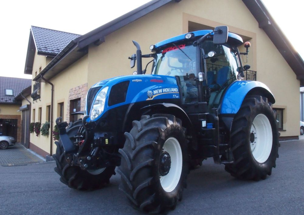 Ciągnik New Holland T7.185 2013 New Holland Autocommand i TUZ - Трактор: фото 1 Ciągnik New Holland T7.185 2013 New Holland Autocommand i TUZ - Трактор: фото 1