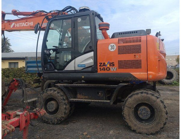Hitachi Zaxis 140W-5B - Колёсный экскаватор: фото 1 Hitachi Zaxis 140W-5B - Колёсный экскаватор: фото 1