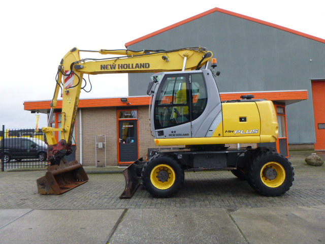 NEW HOLLAND MH PLUS - Колёсный экскаватор: фото 2 NEW HOLLAND MH PLUS - Колёсный экскаватор: фото 2