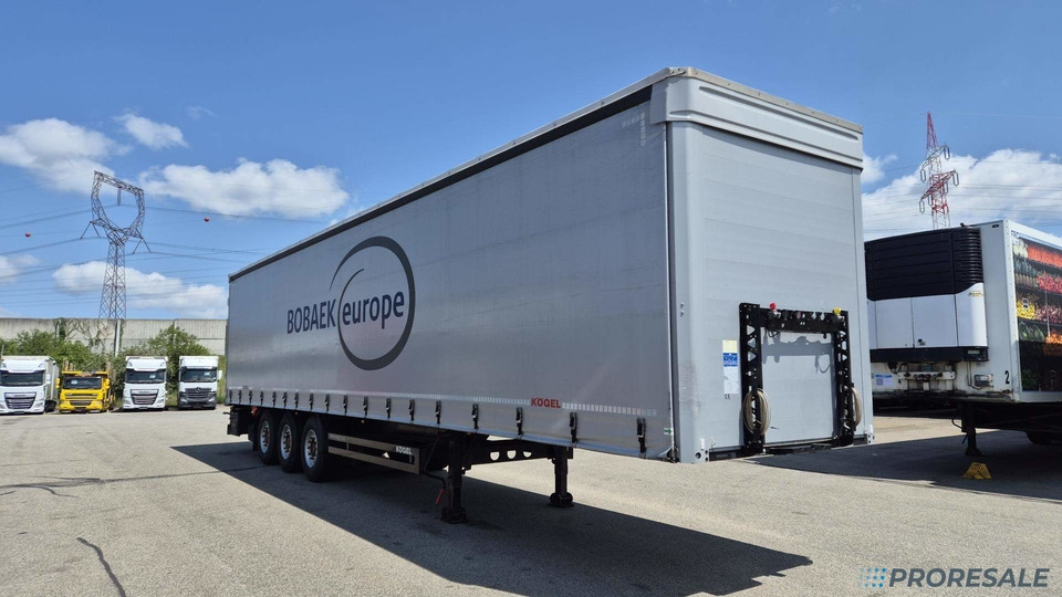 KÖGEL SN 24 CARGO - Тентованный полуприцеп: фото 1 KÖGEL SN 24 CARGO - Тентованный полуприцеп: фото 1