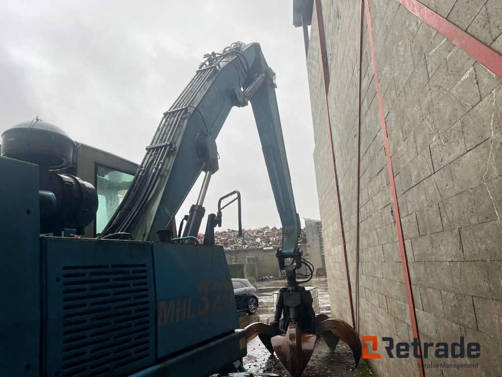 Перегружатель Knusnings- og sorteringsudstyr FUCHS MHL 320 - Skrot sorteringskran: фото 13 Перегружатель Knusnings- og sorteringsudstyr FUCHS MHL 320 - Skrot sorteringskran: фото 13