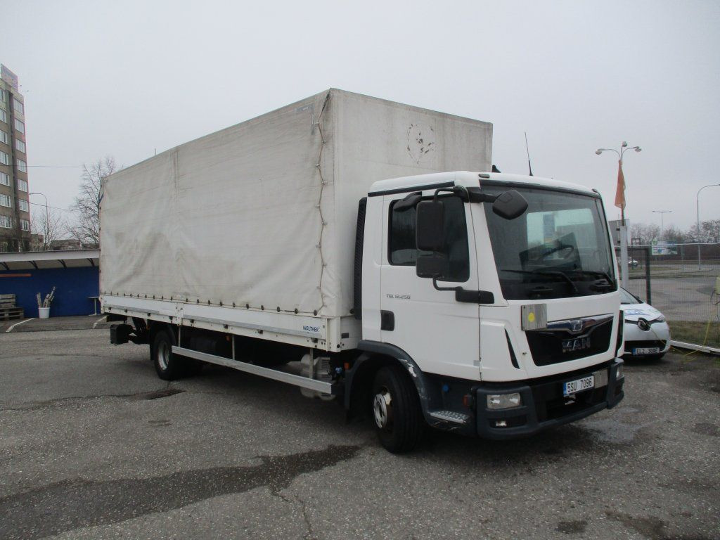 MAN TGL 12.250 - Тентованный грузовик: фото 1 MAN TGL 12.250 - Тентованный грузовик: фото 1