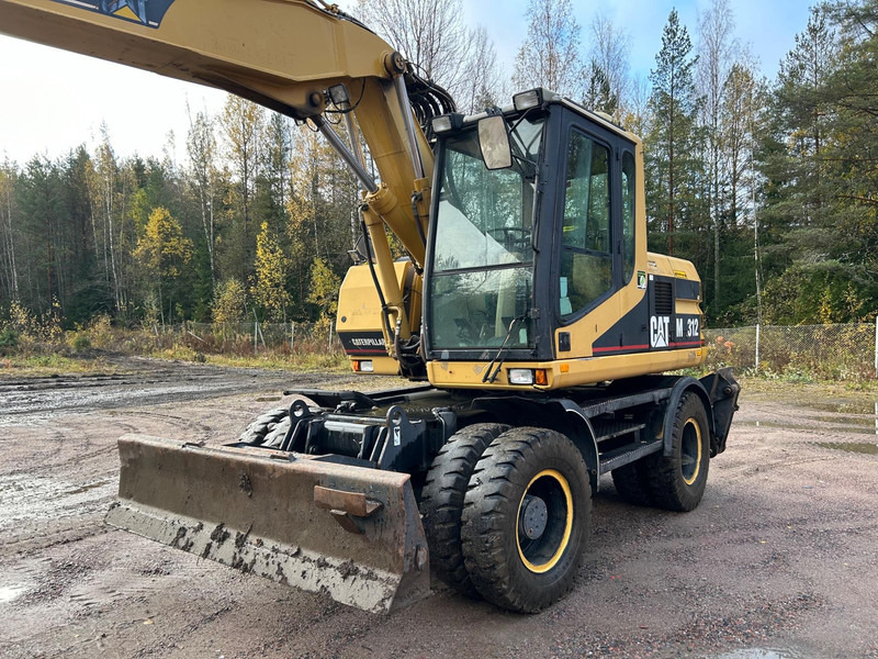 Caterpillar M312 Engcon EC20 tiltrotator - Колёсный экскаватор: фото 2 Caterpillar M312 Engcon EC20 tiltrotator - Колёсный экскаватор: фото 2