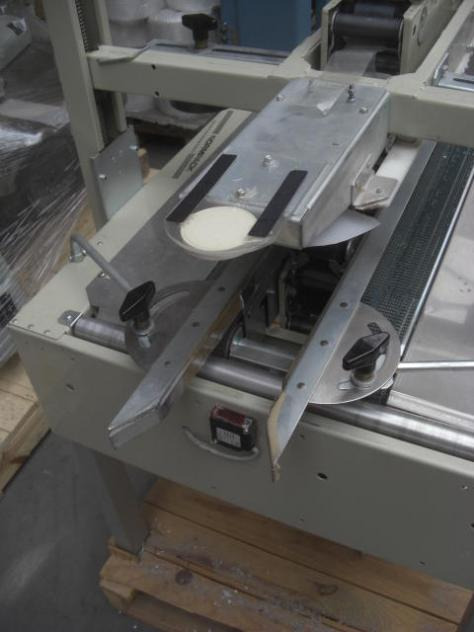 Normpack Tapemat NCG 320 automatic folding carton sealing machine - Упаковочное оборудование: фото 2 Normpack Tapemat NCG 320 automatic folding carton sealing machine - Упаковочное оборудование: фото 2