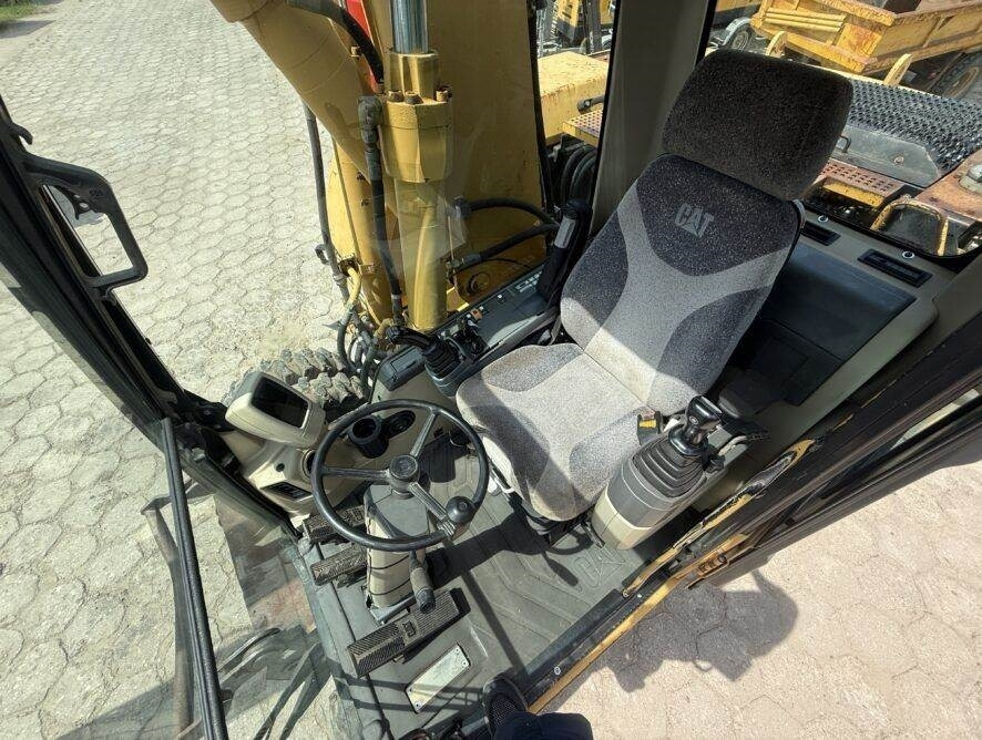 Колёсный экскаватор CAT M315C AC: фото 18