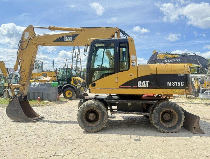 Колёсный экскаватор CAT M315C: фото 1