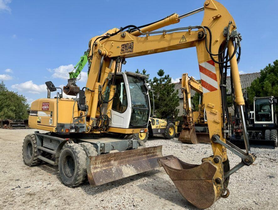 Liebherr A314 - Колёсный экскаватор: фото 5 Liebherr A314 - Колёсный экскаватор: фото 5