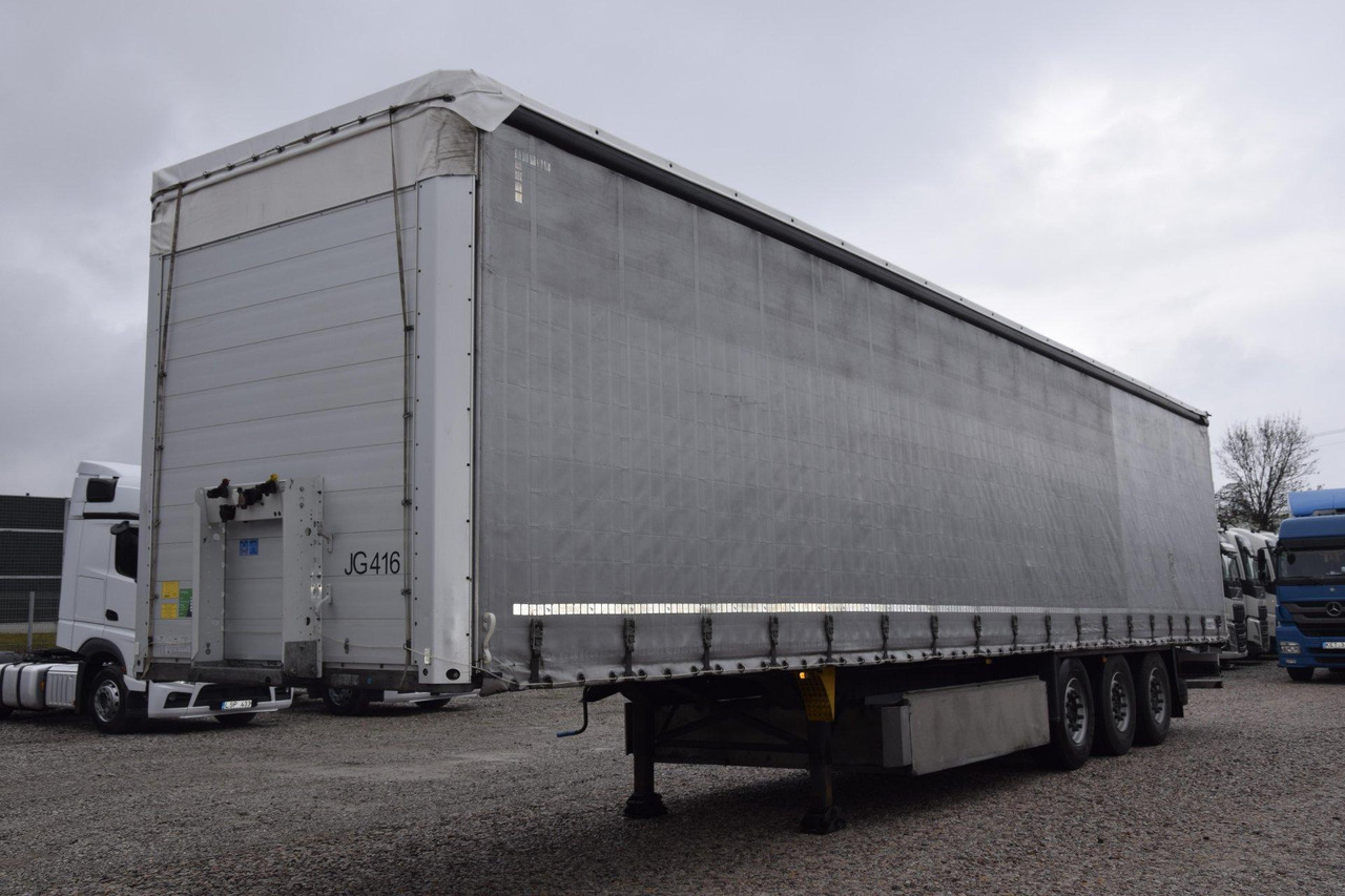 Тентованный полуприцеп Schmitz Cargobull SCS24/L Lifting Axle: фото 1