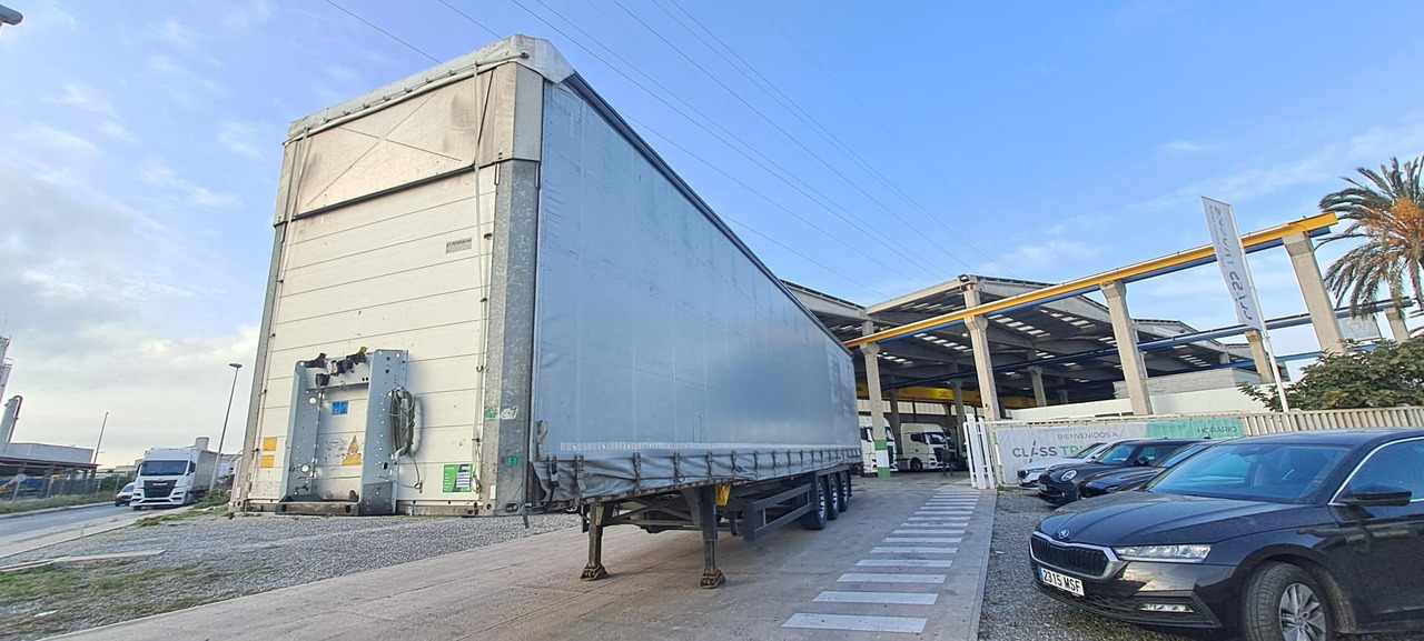 Schmitz Cargobull SCS24/L Varios - Тентованный полуприцеп: фото 1 Schmitz Cargobull SCS24/L Varios - Тентованный полуприцеп: фото 1