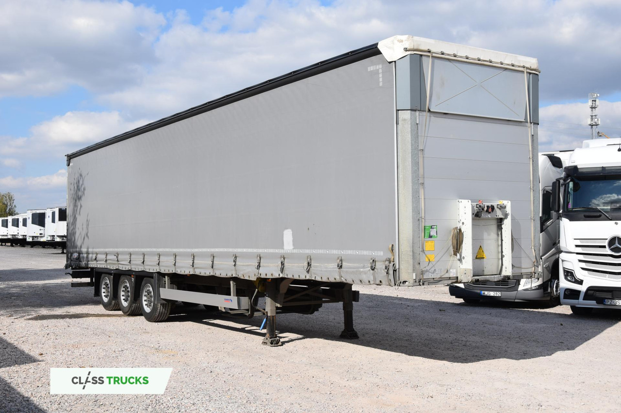 Schmitz Cargobull SCS24/L Varios - Тентованный полуприцеп: фото 1 Schmitz Cargobull SCS24/L Varios - Тентованный полуприцеп: фото 1