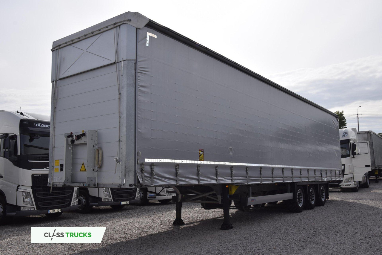 Schmitz Cargobull SCS24/L Varios - Тентованный полуприцеп: фото 1 Schmitz Cargobull SCS24/L Varios - Тентованный полуприцеп: фото 1