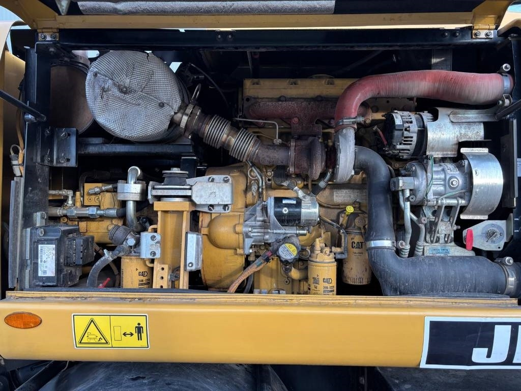 Колёсный экскаватор CAT M 313 D: фото 11