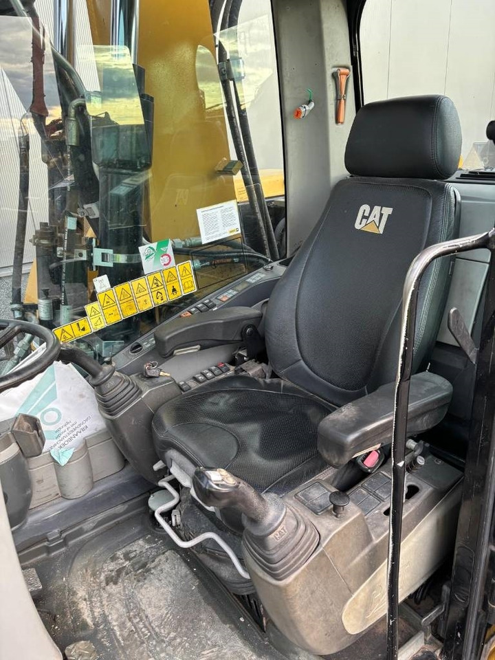 Колёсный экскаватор CAT M 313 D: фото 10