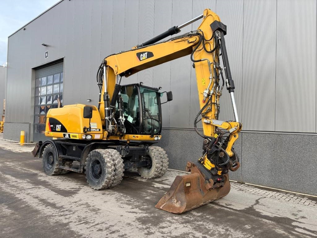 Колёсный экскаватор CAT M 313 D: фото 7