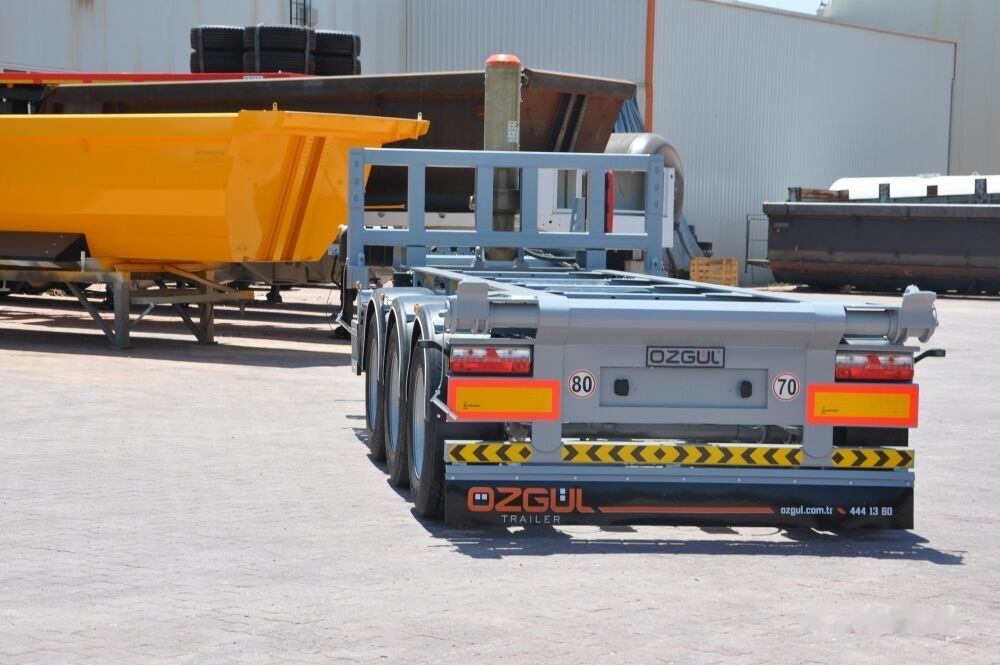 Özgül 40 FT TIPPING CONTAINER CHASSIS AINER CARRIER - Полуприцеп-контейнеровоз/ Сменный кузов: фото 1 Özgül 40 FT TIPPING CONTAINER CHASSIS AINER CARRIER - Полуприцеп-контейнеровоз/ Сменный кузов: фото 1