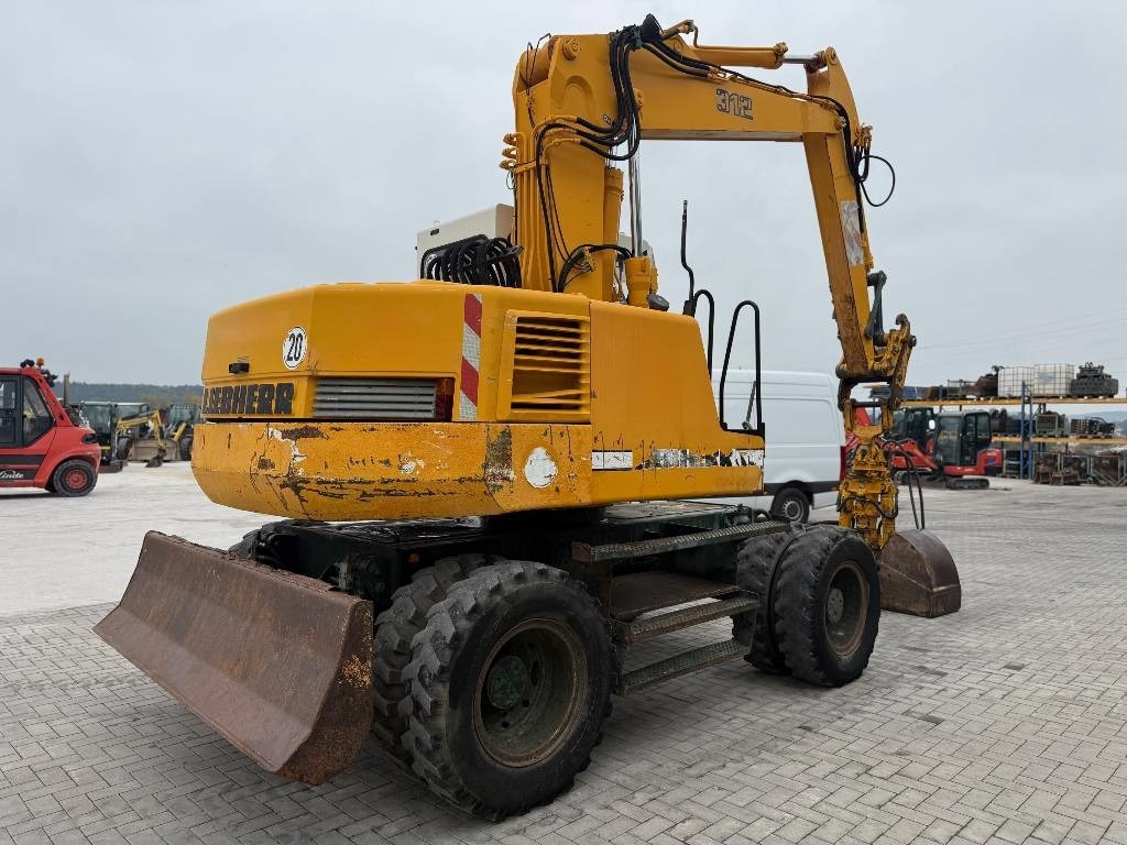 Liebherr A 312 - Колёсный экскаватор: фото 5 Liebherr A 312 - Колёсный экскаватор: фото 5