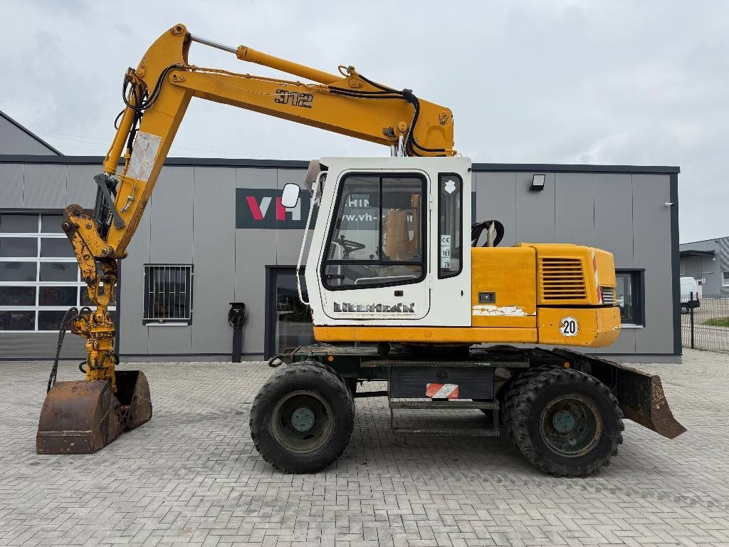 Liebherr A 312 - Колёсный экскаватор: фото 2 Liebherr A 312 - Колёсный экскаватор: фото 2