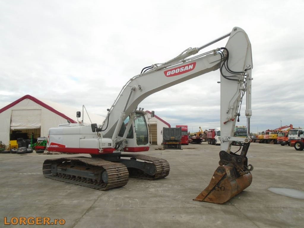Doosan DX 225 LC with 18m long reach boom - Гусеничный экскаватор: фото 5 Doosan DX 225 LC with 18m long reach boom - Гусеничный экскаватор: фото 5