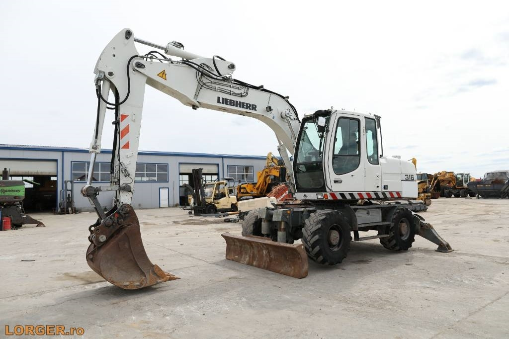 Liebherr A 316 Litronic - Колёсный экскаватор: фото 5 Liebherr A 316 Litronic - Колёсный экскаватор: фото 5
