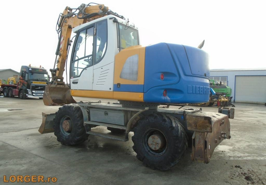Liebherr A 914 Compact - Колёсный экскаватор: фото 2 Liebherr A 914 Compact - Колёсный экскаватор: фото 2