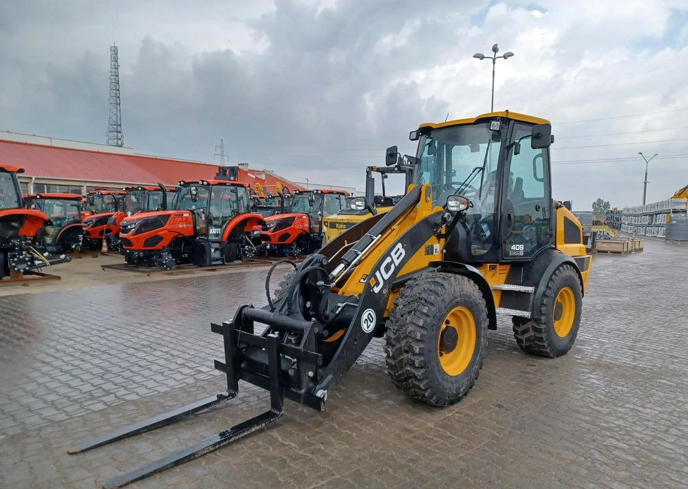 JCB 409 - Колёсный погрузчик: фото 2 JCB 409 - Колёсный погрузчик: фото 2