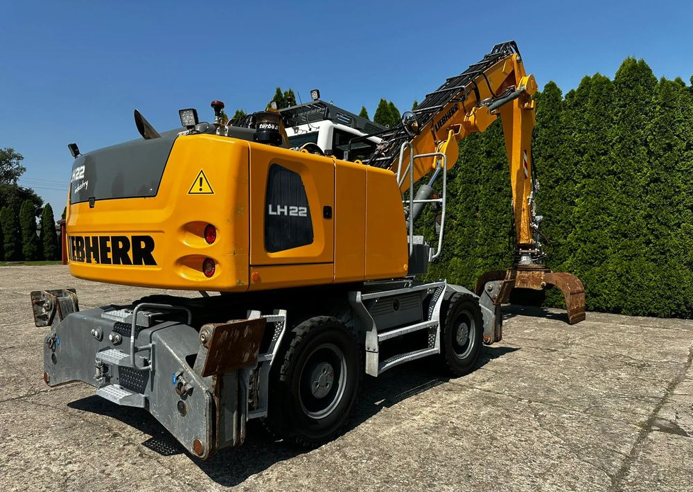 Liebherr LH22 M - Колёсный экскаватор: фото 1 Liebherr LH22 M - Колёсный экскаватор: фото 1