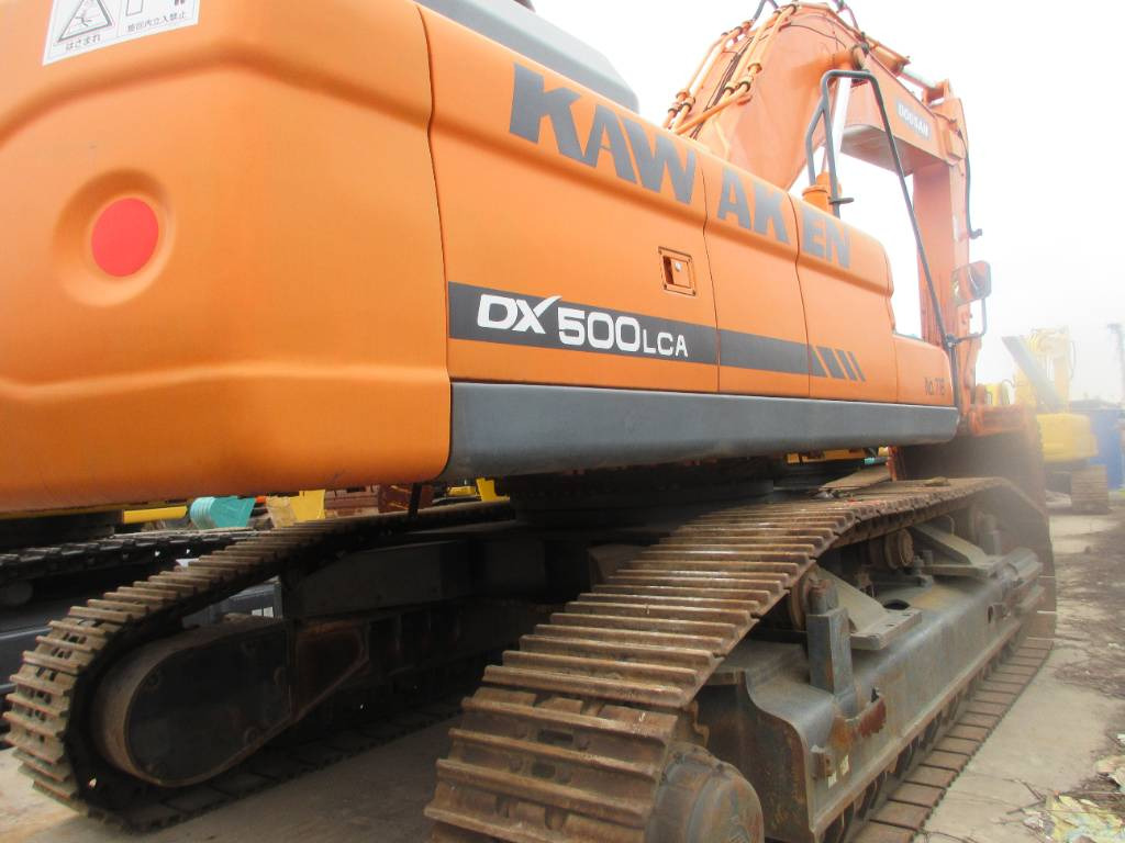 Doosan DX 500 LCA - Гусеничный экскаватор: фото 2 Doosan DX 500 LCA - Гусеничный экскаватор: фото 2
