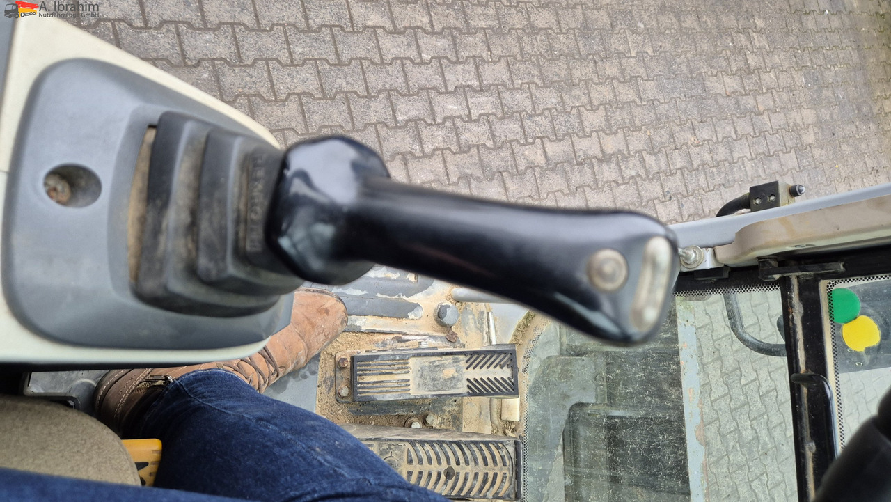 New Holland MH 2.6 Zustand gut, deutsche Maschine incl. Greifer und Dreservo - Колёсный экскаватор: фото 4 New Holland MH 2.6 Zustand gut, deutsche Maschine incl. Greifer und Dreservo - Колёсный экскаватор: фото 4