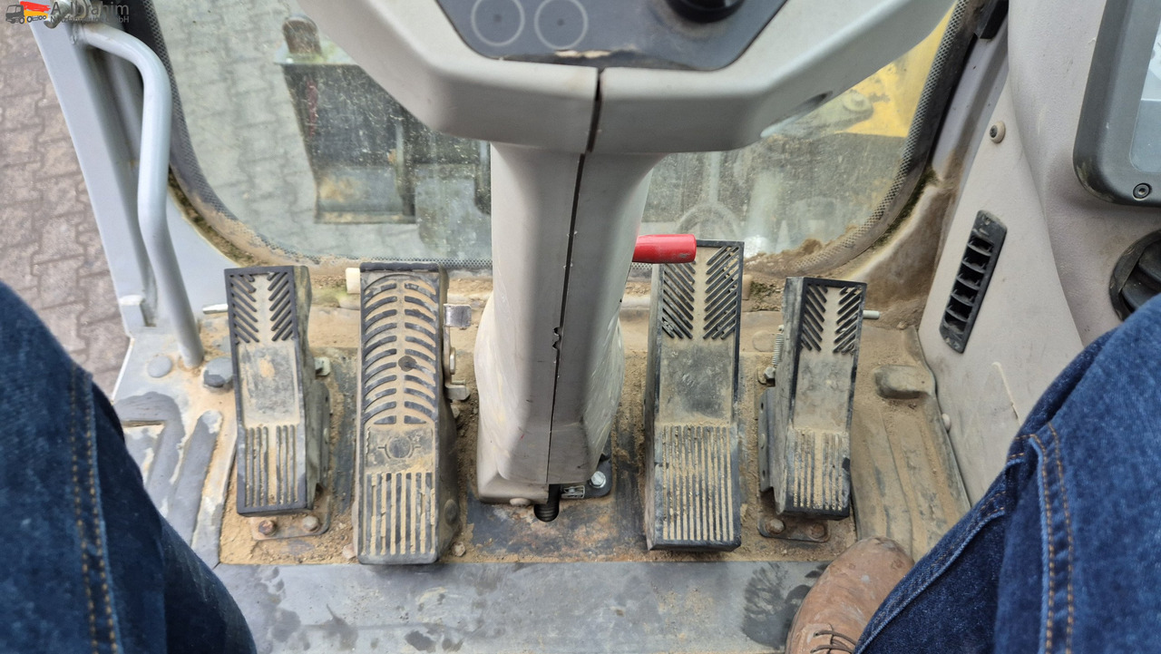 New Holland MH 2.6 Zustand gut, deutsche Maschine incl. Greifer und Dreservo - Колёсный экскаватор: фото 5 New Holland MH 2.6 Zustand gut, deutsche Maschine incl. Greifer und Dreservo - Колёсный экскаватор: фото 5