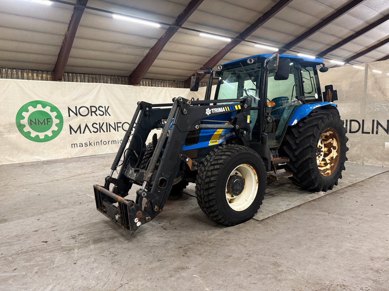 New Holland T5060 - Трактор: фото 1 New Holland T5060 - Трактор: фото 1