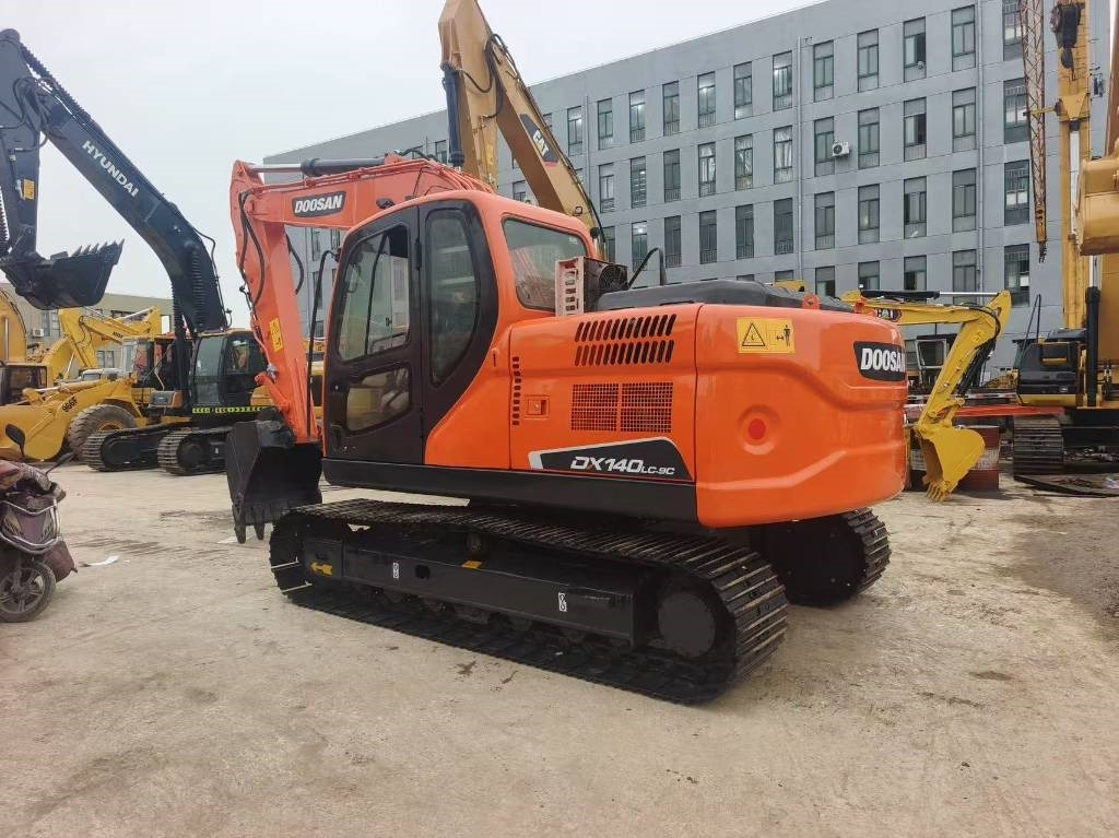 Doosan DX 140 - Гусеничный экскаватор: фото 1 Doosan DX 140 - Гусеничный экскаватор: фото 1